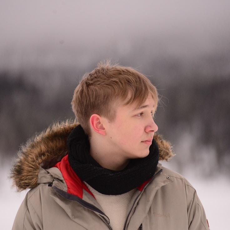 Kaveri Mehta, Lead Design Curator at GoldenCornerHub, reviewing corporate floral arrangements